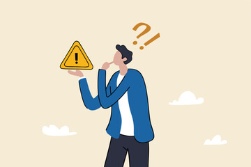 Concern or doubt to make decision, worried for problem or issue, attention or challenge ahead, distrust or trouble concept, businessman holding exclamation mark sign with concern to solve problem.