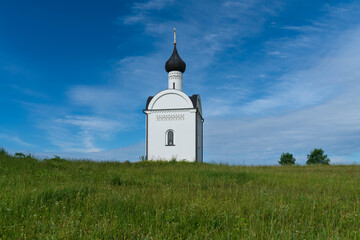 View of the Chapel of the Sovereign Icon of the Mother of God on the Sacred Hill of the Unity of Russia on a sunny summer day, Izborsk, Pskov region, Pechersk district, Russia