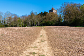 St Giles' church and footpath in Shipbourne near Tonbridge, Kent, England in Spring