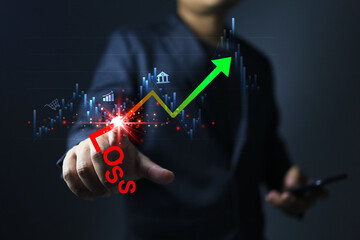 Stop loss concept where businessmen point chart to cut off the loss and keep portfolio profitable...