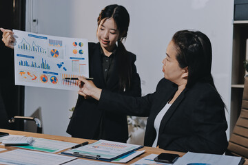 Business analyze,Close up Business people meeting to discuss the situation on the market. Business Financial Concept