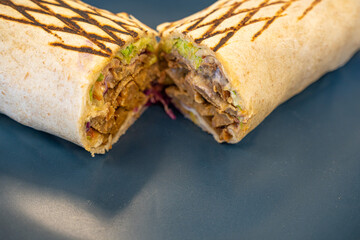 Grilled beef chicken shawarma wrap ready to eat