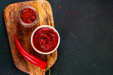 Traditional Korean fermented red chili pepper paste, Gochujang, spicy, sweet-salty, deep umami flavor, food ingredient for preparing asian dishes