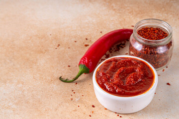 Traditional Korean fermented red chili pepper paste, Gochujang, spicy, sweet-salty, deep umami flavor, food ingredient for preparing asian dishes