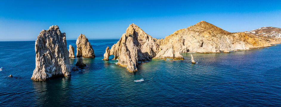 El Arco de Cabo San Lucas, Baja California Sur, Mexico,  panoramic aerial view of Lands End, the southernmost tip of the Baja California peninsula, located in the Pacific Ocean - with 1 tourist boat 