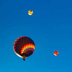 Fototapeta premium Alpine winter view with hot air balloons at Gosau, Abtenau, Salzkammergut, Salzburg, Austria