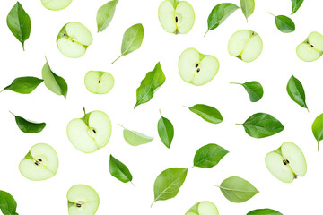 Green apple with green leaf and half slice flying in the air isolated on white background.