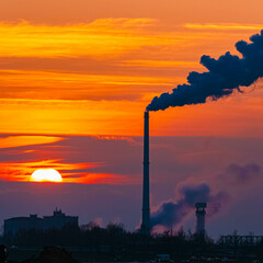 Sunset or sundowner with a sugar factory silhouette near Plattling, Isar, Deggendorf, Bavaria,...