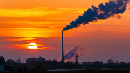 Sunset or sundowner with a sugar factory silhouette near Plattling, Isar, Deggendorf, Bavaria,...