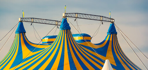 Yellow blue circus tents on a sunny winter day at Straubing, Straubing-Bogen, Bavaria, Germany