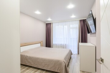 interior room apartment bedroom with bed, cozy place to sleep and relax