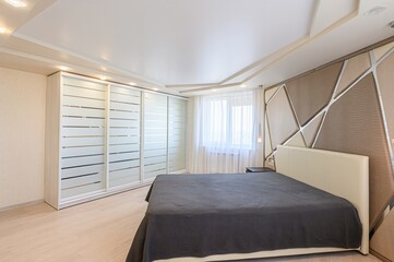 interior room apartment bedroom with bed, cozy place to sleep and relax