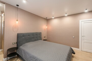 interior room apartment bedroom with bed, cozy place to sleep and relax