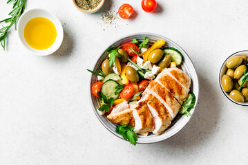 Grilled chicken fillet and greek salad