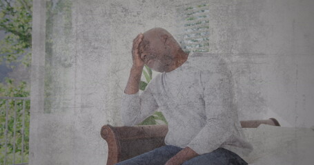 Image of moving background over sad senior african american man