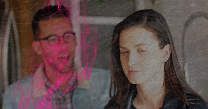 Image of pink flame over caucasian couple arguing - Powered by Adobe