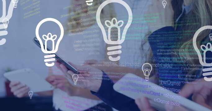 Image of data processing over caucasian businesswomen with tablet - Powered by Adobe