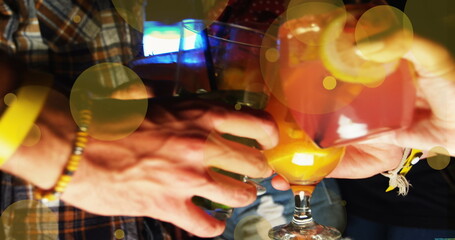 Image of spots over diverse friends with drinks