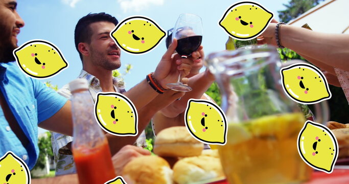 Image of lemon icons over diverse friends at table with drinks