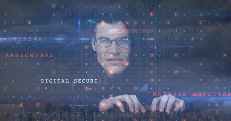 Image of caucasian male hacker and cyber attack warning over cityscape