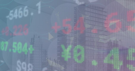 Image of stock market over cityscape