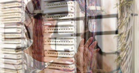Image of women using vr headset over server room