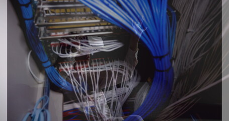 Image of women using vr headset over server room
