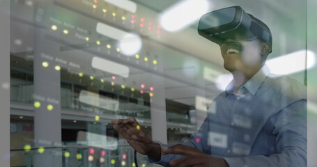 Image of men using vr headset over server room