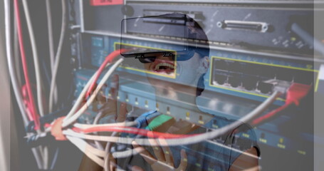 Image of women using vr headset over server room