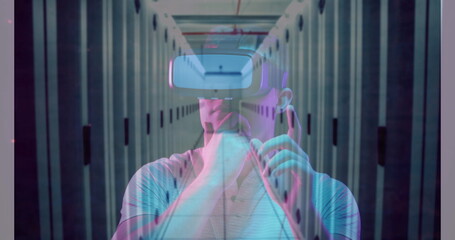 Image of men using vr headset over server room