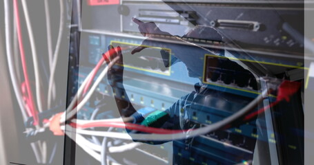 Image of men using vr headset over server room