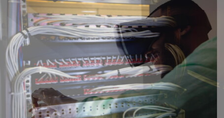 Image of men using vr headset over server room