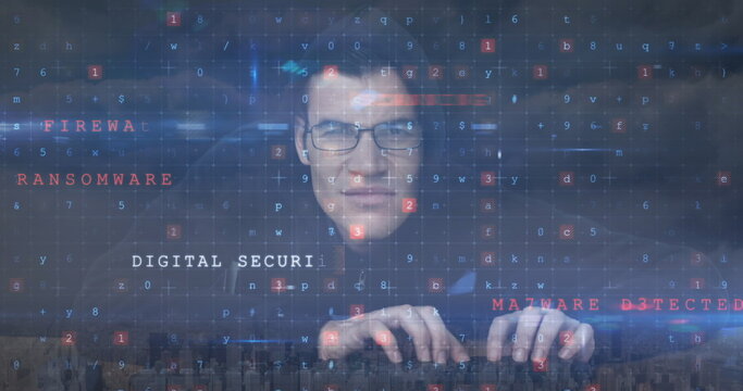 Image of caucasian male hacker and cyber attack warning over cityscape