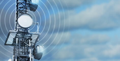 antenna tower as phone base station  with radio waves isolated on cloudy sky background, concept with copy space for wireless and mobile communication, tv and internet