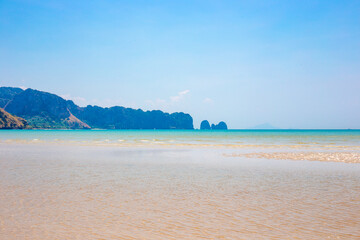 Sea rocky landscape. Nopparat Thara beach with rocks and clear water in Krabi province, Thailand. Travel and tourism