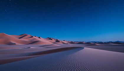 Naklejka premium Vast, empty desert landscape; towering sand dunes under a vibrant blue gradient starry night sky, bright, outdoor