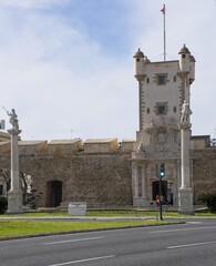 Cadiz, Spain - Mar 19, 2025: Walking in Cadiz. Puerta de Tierra. Streets, buildings. Lifestyle in the urban area. Sunny spring day. Selective focus