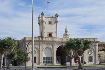 Cadiz, Spain - Mar 19, 2025: Walking in Cadiz. Puerta de Tierra. Streets, buildings. Lifestyle in the urban area. Sunny spring day. Selective focus