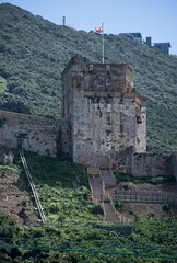 Gibraltar, United Kingdom - Mar 26, 2025: Walking in Gibraltar. Moorish Castle. Streets, buildings. Lifestyle in the urban area. Sunny spring day. Selective focus