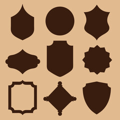 A Set of 9 Black and Brown Silhouette Vintage Decorative Labels