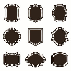 A Set of 9 Black and Brown Silhouette Vintage Decorative Labels