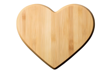 Heart-shaped bamboo cutting board on a white isolate background.