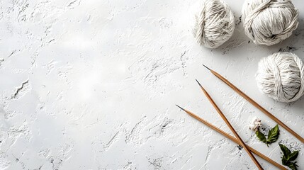 Minimalist Knitting Supplies on Textured White Background