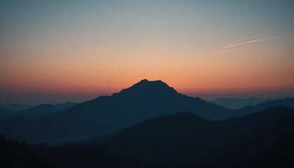 Naklejka premium Stunning mountain sunrise overlooking a serene valley landscape nature photography calm environment panoramic viewpoint peaceful concept