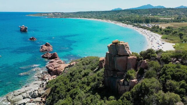 Aerial drone view of the Cea beach with the Red Rocks, Sardinia, Italy