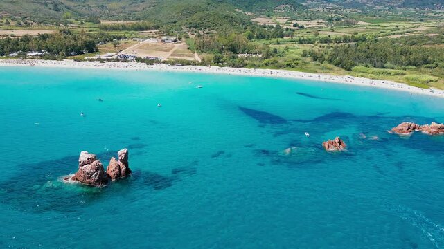 Aerial drone view of the Cea beach with the Red Rocks, Sardinia, Italy