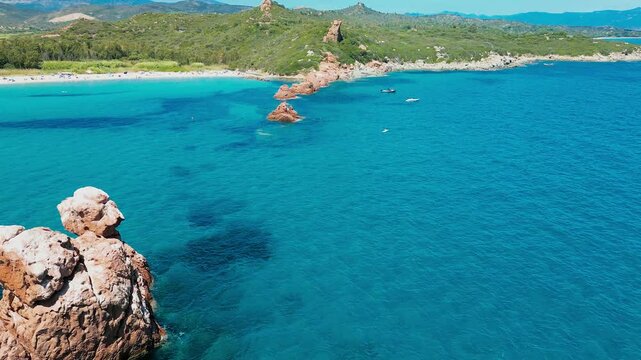Aerial drone view of the Cea beach with the Red Rocks, Sardinia, Italy