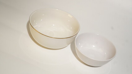 Elegant Pair of Ceramic Bowls on a Clean White Surface Minimalist Style