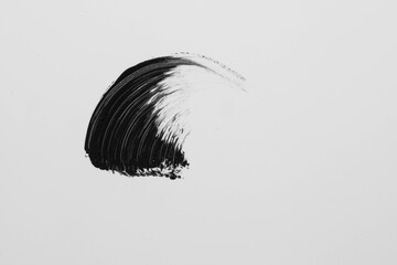 swatch of black ink on a white background