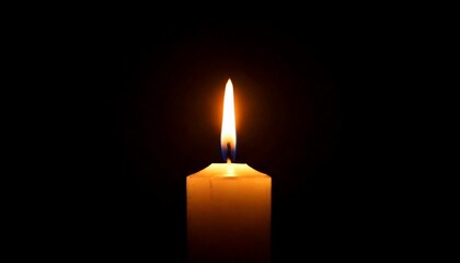 One candle burning slowly isolated on pitch black background